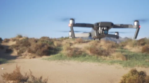 Drone flying in front of the camera Видео 98749558