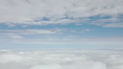 Drone Flying High Above the Clouds on Overcast Day Stock Footage 318175744