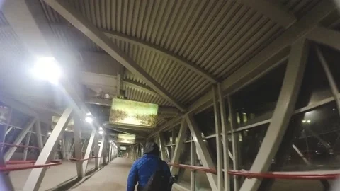 Drone flying inside pedestrian bridge in winter Stock Footage 171881977