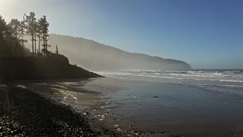 Drone flying low in the Oregon beach ocean in a sunny day 스톡 동영상 145821597