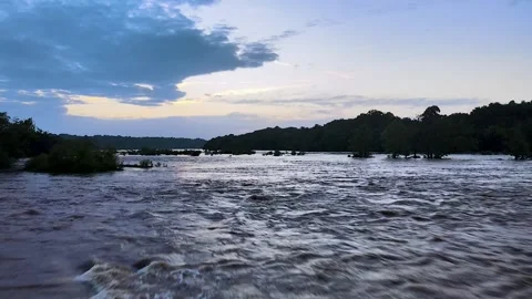 Drone flying low over James River during Sunset Stock Footage