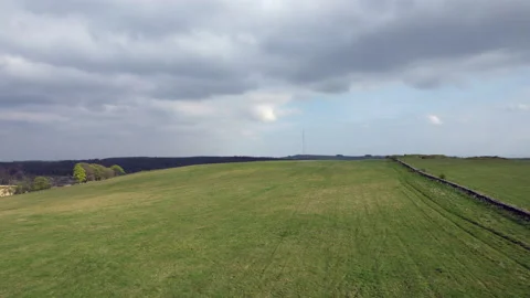 Drone Flying Low Over Mendip Hills Towards Woods And Penn HIll. Somerset. UK. Vídeo Stock 188587251