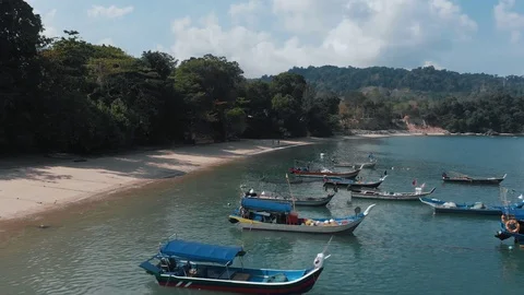 A drone flying low over moored boats. Langkawi, Malaysia Stock Footage 106806836