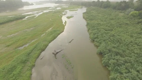 Drone Flying Low Over River To Cliff Raw Stock Footage 78886737