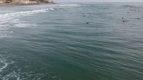 Drone Flying Low Over Surfers Stock Footage 84747625