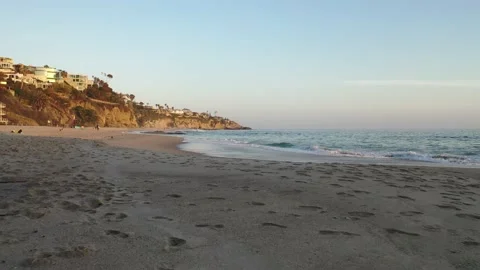 Drone Flying Low over Thousand Steps Beach into the Ocean Laguna Beach Stock Footage 150939568