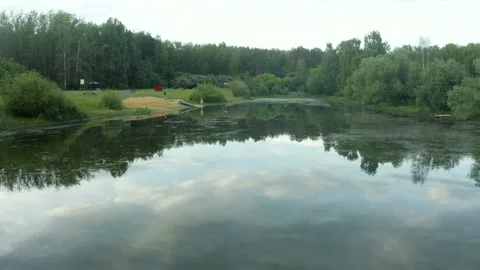 Drone Flying Low Over Water with Amazing Sunset Reflection in Lake High speed na 스톡 동영상 208423752