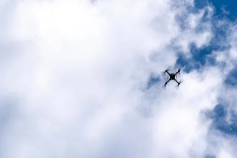 A drone flying in the middle of the Stock Photos