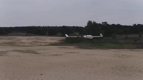 Drone flying much closer around another drone in mid air Stock Footage 84938466