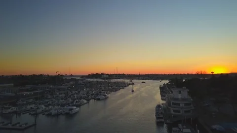 Drone flying in one place looking over Dock and Boats with Sunset 스톡 동영상 86297240