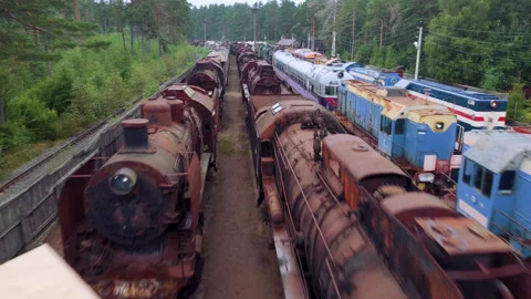 Drone flying over abandoned Soviet trains. Summer day. The Gulf of Finland Stock Footage 168474702