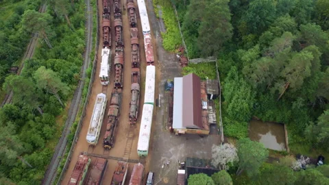 Drone flying over abandoned Soviet trains. Summer day. The Gulf of Finland Stock Footage 168479457