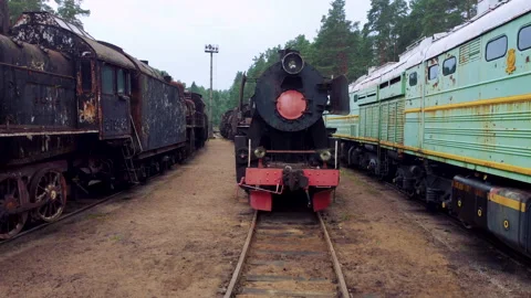 Drone flying over abandoned Soviet trains. Summer day. The Gulf of Finland Stock Footage 168491240