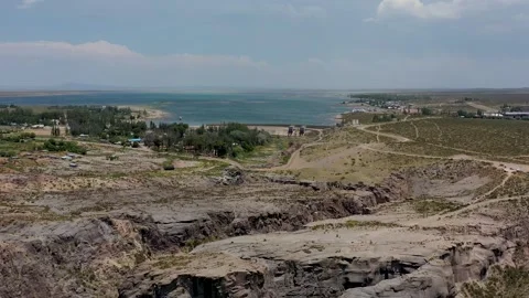 Drone flying over the Atuel river, that flows through the Atuel canyon Stock Footage 255900430
