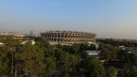 Drone flying over azteca stadium Mexico City  ascent sunset Vidéo 74631642