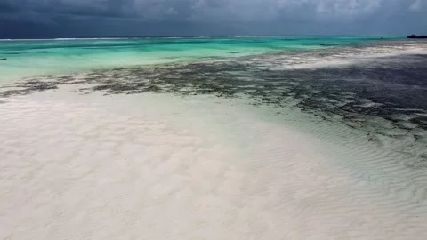 The drone is flying over the azure. Flying over the ocean with blue water. Stock Footage 194553755