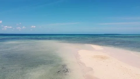 The drone is flying over the azure. Flying over the ocean with blue water. Stock Footage 194554664