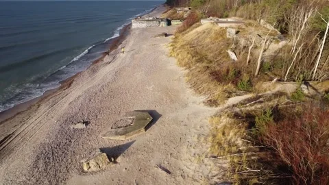 Drone Flying Over Baltic Waves Toward Abandoned WWII Bunker in Klaipeda Stock Footage 330231977