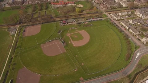 Drone flying over baseball field in Huizen Noord-holland Stock Footage 75351478