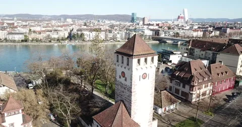 Drone flying over Basel City Switzerland beside River Rhein slow pan around Stock Footage 140279804