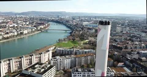 Drone flying over Basel City Switzerland chimney reveal River Rhein- Stock Footage 140280125