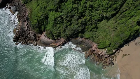 Drone flying over beach and mountain, beach, rocks and mountain with forest Stock Footage 229851773