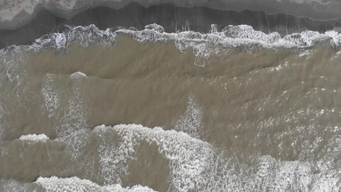 Drone flying over of big waves in Shekvetili sand beach Video stock 117971448