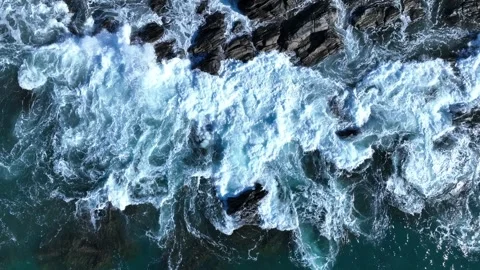 Drone Flying Over Big Waves Crashing on Rocky Coastline, Revealing Raw Landscape Stock Footage 309951096