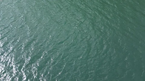 Drone flying over blue ocean waters. Stock Footage 247030374