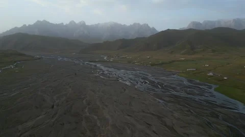 Drone flying over braided river in Kok Kiya Valley, Kyrgyzstan 스톡 동영상 347217224