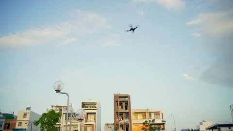 Drone flying over the building at sunset rapid slow motion Stock Footage 86404899