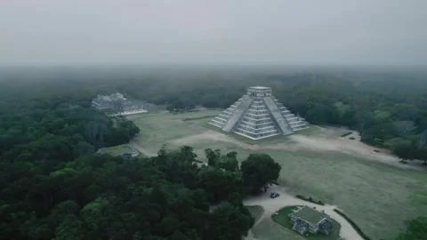 Drone Flying Over Chichen Itza Pyrmid Foggy Fog Morning Clouds Mayan Stockbeeldmateriaal 347844596