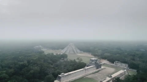 Drone Flying Over Chichen Itza Pyrmid Foggy Fog Morning Clouds Mayan Stockbeeldmateriaal 347844602