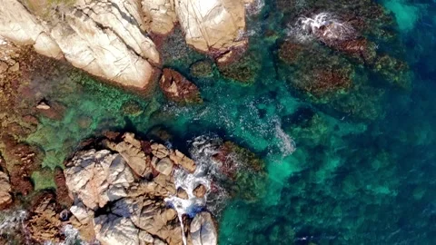 Drone Flying Over Clear Turquoise Sea with Downward View Stock Footage 306015220