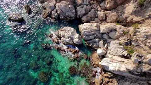 Drone Flying Over Clear Turquoise Sea with Downward View Stock Footage 306015267