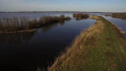 Drone flying over a coast in The Netherlands, Huizen, Noord-Holland Stock Footage 75352011
