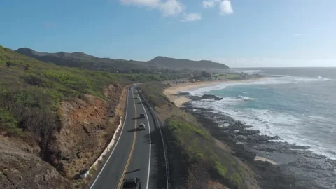 Drone Flying Over Coastal Highway At Sandy Beach Park In Honolulu, Hawaii Stock Footage 154172232