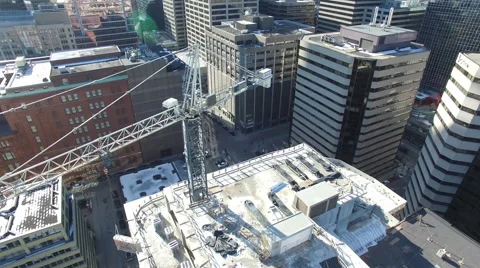 Drone flying over a crane moving materials Video stock 64124114