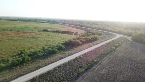 A drone flying over a crop field Stock Footage 94587592