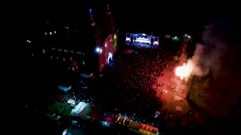 Drone flying over crowd and people watching a great fireworks show. Stock Footage 231424783