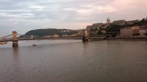 Drone flying over the Danube River and chain bridge towards Budapest Castle Stock Footage 114667771