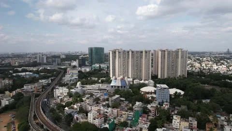 Drone flying over a dense cityscape with skyscrapers in Bangalore India Stock Footage 339127797