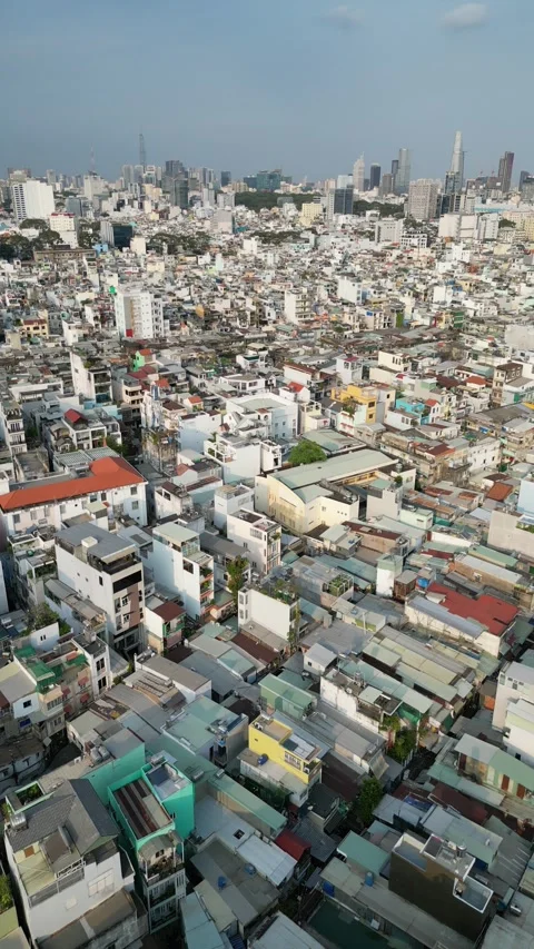 Drone Flying Over Dense Urban Rooftops of Ho Chi Minh City, Vietnam Stock Footage 335576012