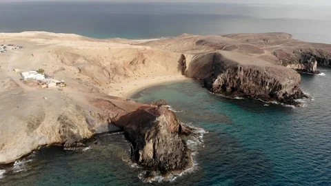 Drone flying over desert bay beach in Canary Islands Stock Footage 124490840