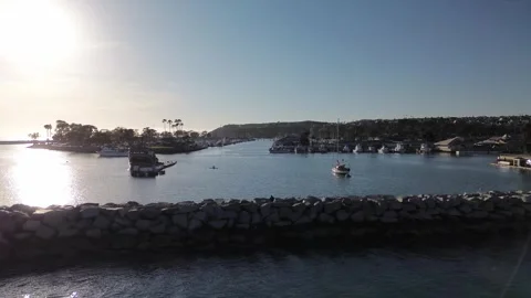 Drone flying over Doheny parallel to Dana Point Harbor Video stock 268358246