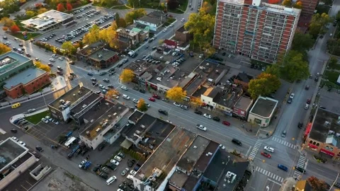 Drone flying over downtown shops in Mississauga at sunrise. Vídeos de archivo 236388673
