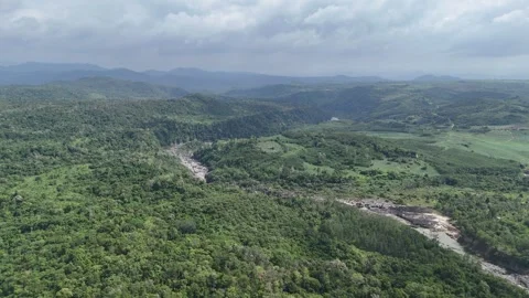 Drone flying over Ea So National Park and winding river, Dak Lak 動画素材 337397669