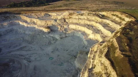 Drone flying over the edge of a sand pit Stock Footage 161878465