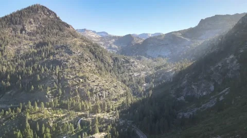Drone flying over emerald bay towards Eagle Falls and Desolation Stock Footage 157411513