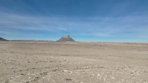 Drone flying over empty desert as it approaches The Butte in Caineville Utah Stock Footage 165568250